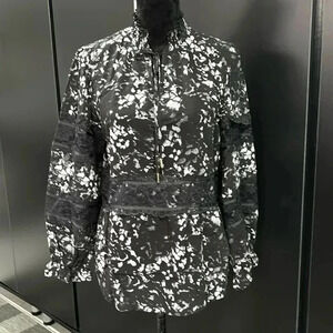 DKNY Sheer Lace embellished,lined,lettuce ruffle high tie neck,ruffle cuff